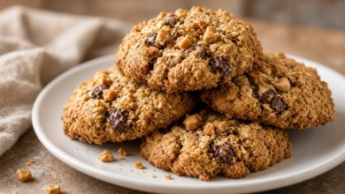 Stack of homemade Butterfinger oatmeal cookies with candy pieces