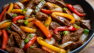 Chinese Pepper Steak stir-fry with beef, bell peppers, and onions in glossy sauce