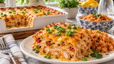 Cheesy King Ranch chicken casserole in a baking dish with a serving scooped out