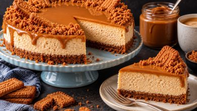 No-bake cookie butter cheesecake slice with spiced cookie crust and cookie butter drizzle