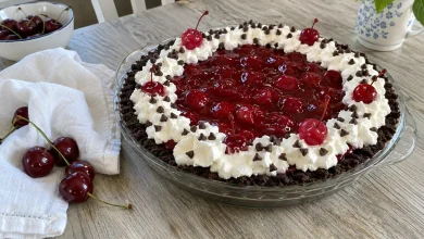 No-bake chocolate cherry pie with cherry topping, whipped topping and mini chocolate chips