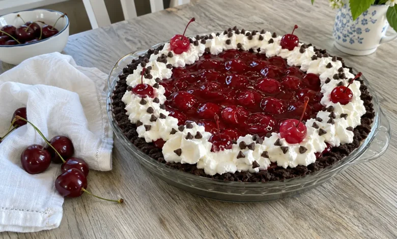 No-bake chocolate cherry pie with cherry topping, whipped topping and mini chocolate chips
